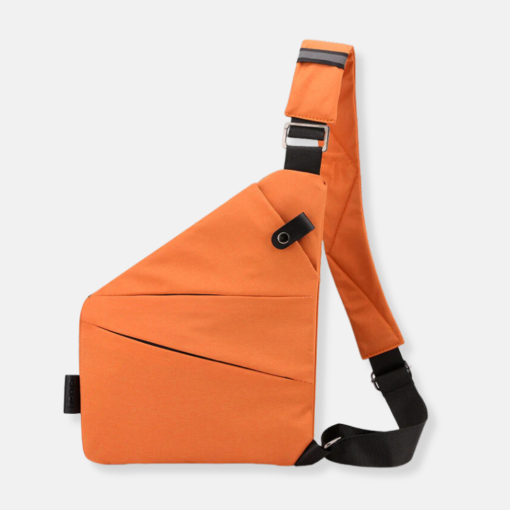Zijaanzicht van de modieuze crossbodytas voor dames met handige opbergvakken en stevige ritsen.