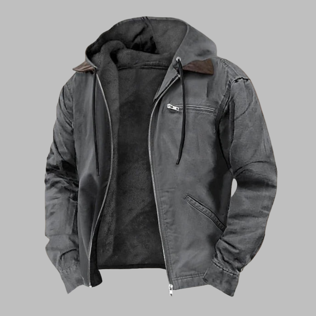 Grijze herenjas, elegant en comfortabel. Deze jas is een veelzijdige toevoeging aan elke herenmode collectie.