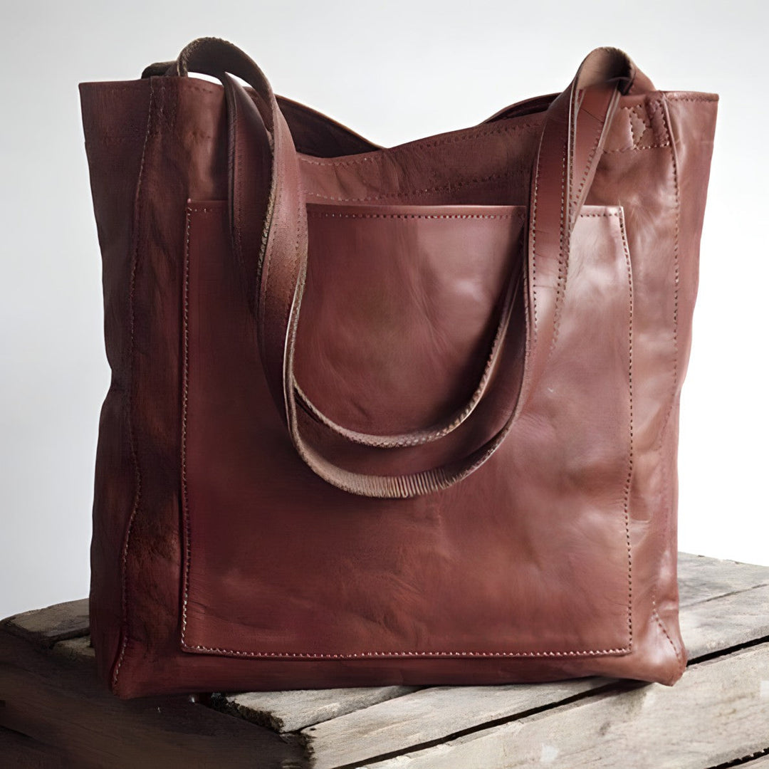 Stijlvolle donkerbruine Sophie damestas, gemaakt van PU-leer. Elegante en veelzijdige schoudertas voor dames.