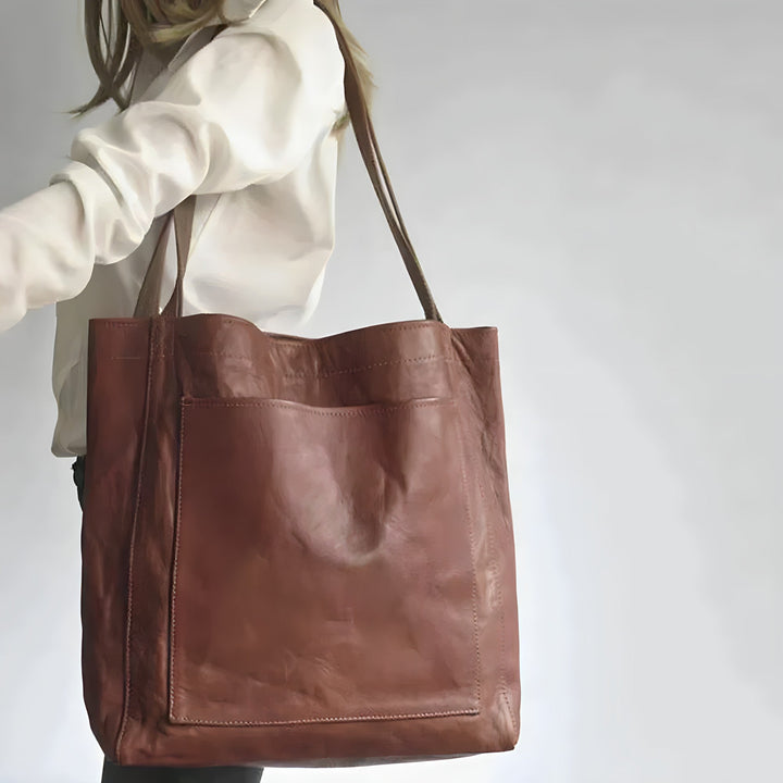 Chique Sophie handtas van PU-leer in bruin. Ruime en praktische damestas, perfect als elegante schoudertas.