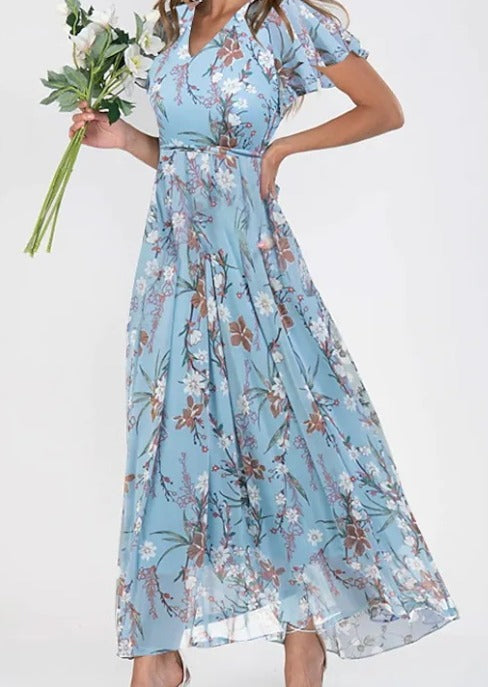 Vrouwelijke bloemen maxi jurk met fladdermouwen en A-lijn; perfect als casual of chique zomerjurk.