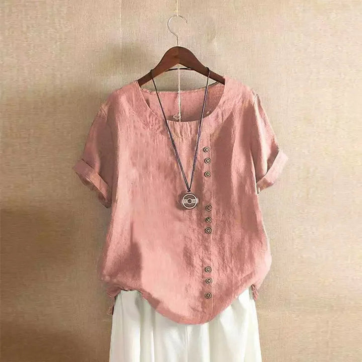 Elegante dames blouse met korte mouwen, trendy knoopdetails en losse pasvorm, ideaal voor zomer.
