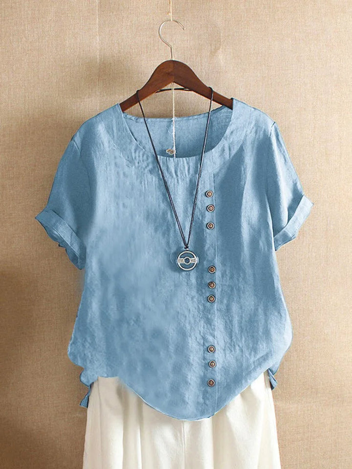 Stijlvolle elegante dames blouse met korte mouwen, perfect voor de zomer, met subtiele knoopjes.