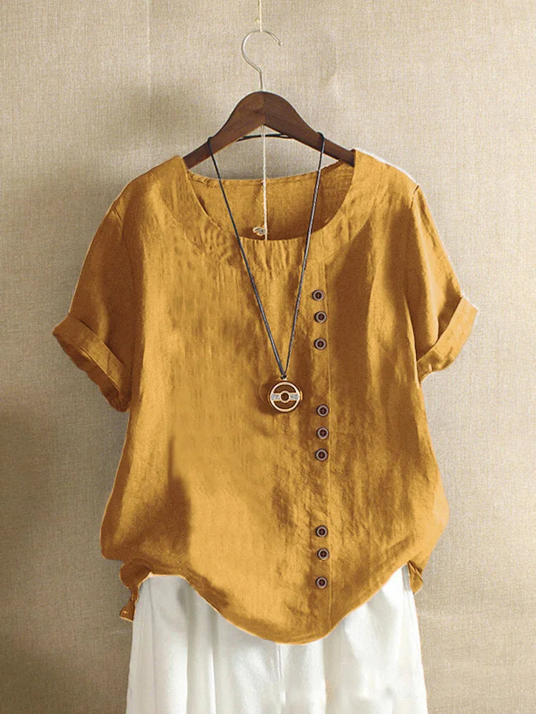 Veelzijdige dames blouse, korte mouw, losse pasvorm, knoopdetails; ideaal voor zowel casual als chique.