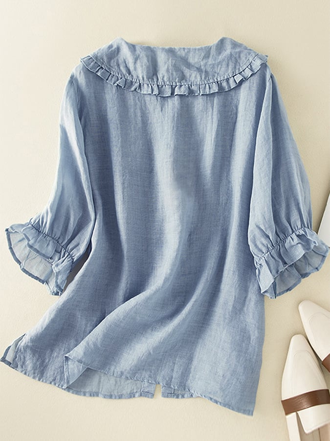 Stijlvolle dames blouse met losse pasvorm, rucheskraag en 3/4 mouwen. Creëer een casual chic look met deze top.