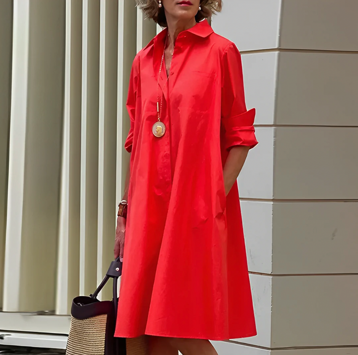 Elegante dames blousejurk met tijdloze stijl, perfect voor lente en zomer. Veelzijdige en stijlvolle dameskleding.