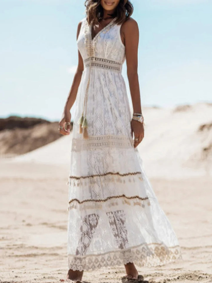 Bohemian maxi jurk van polyester met V-hals, verfijnd kant en enkellange pasvorm.