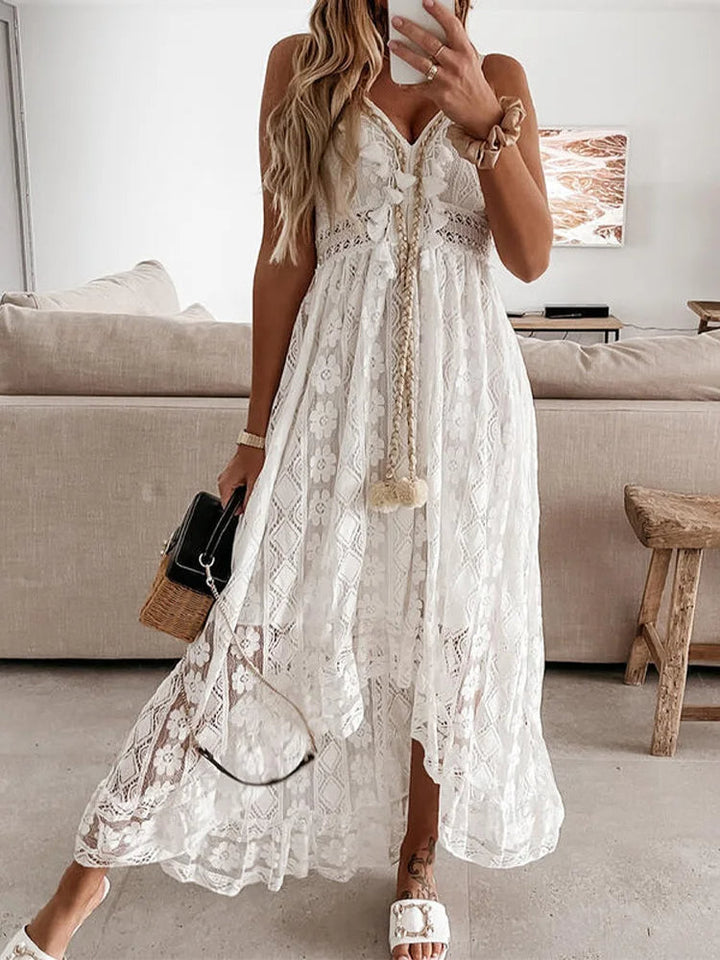 Chique bohemian dames maxi jurk, perfect voor vakantie, met kanten details en flair mouwen.