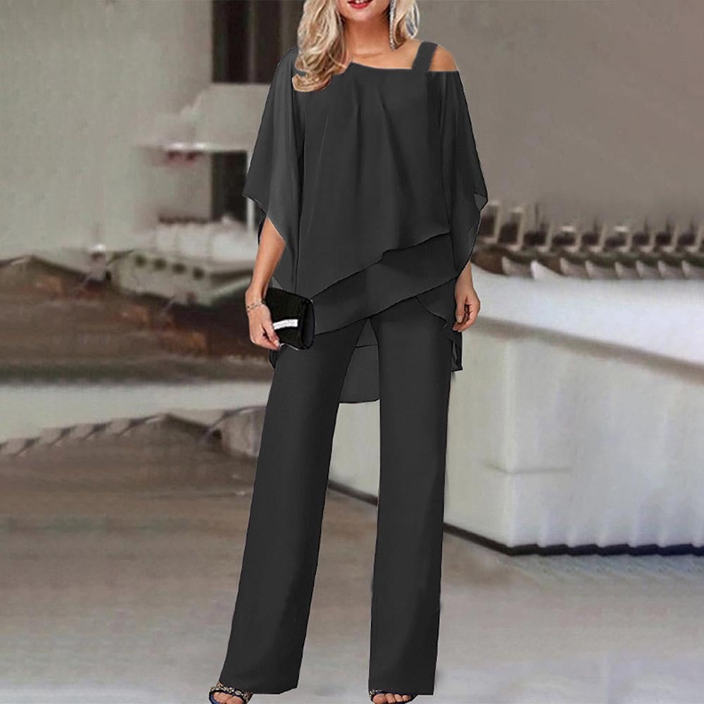 Comfortabele en elegante dames cold-shoulder tweedelige set. Geschikt voor zowel zakelijke als feestelijke gelegenheden.