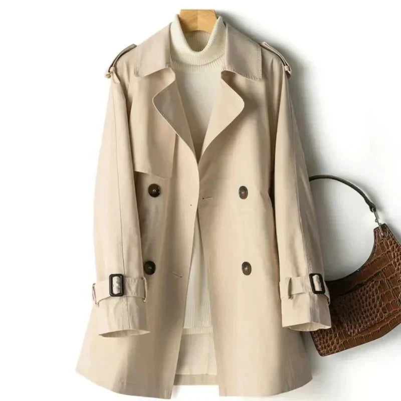 Elegante dames dubbelrij trenchcoat met ceintuur, ideaal voor een klassieke stijl in de herfst en lente.