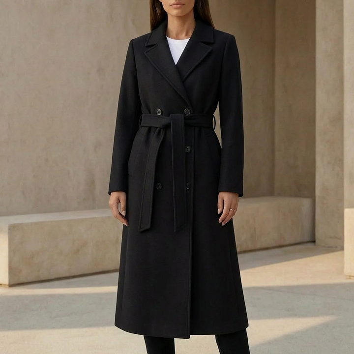 Elegante dames lange jas, dubbelgebreid polyester, getailleerd met strikceintuur. Ideale klassieke tussenjas.