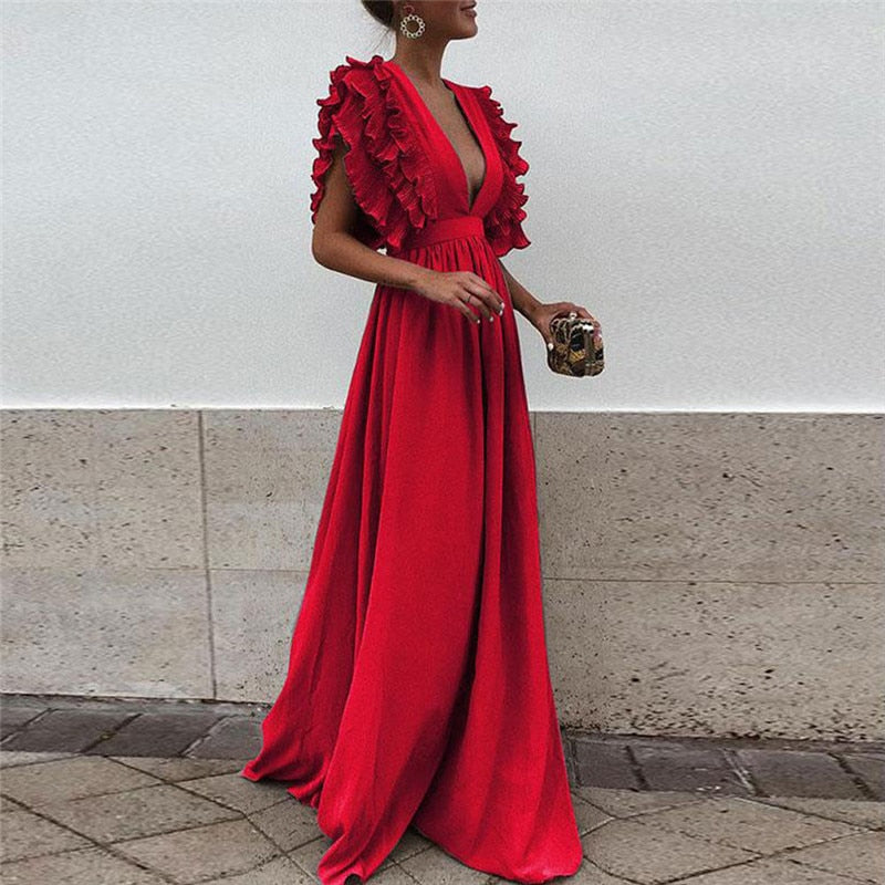 Kleurrijke MacksDress lange damesjurk, comfortabel en modieus, ideaal als zomer- of winterjurk.