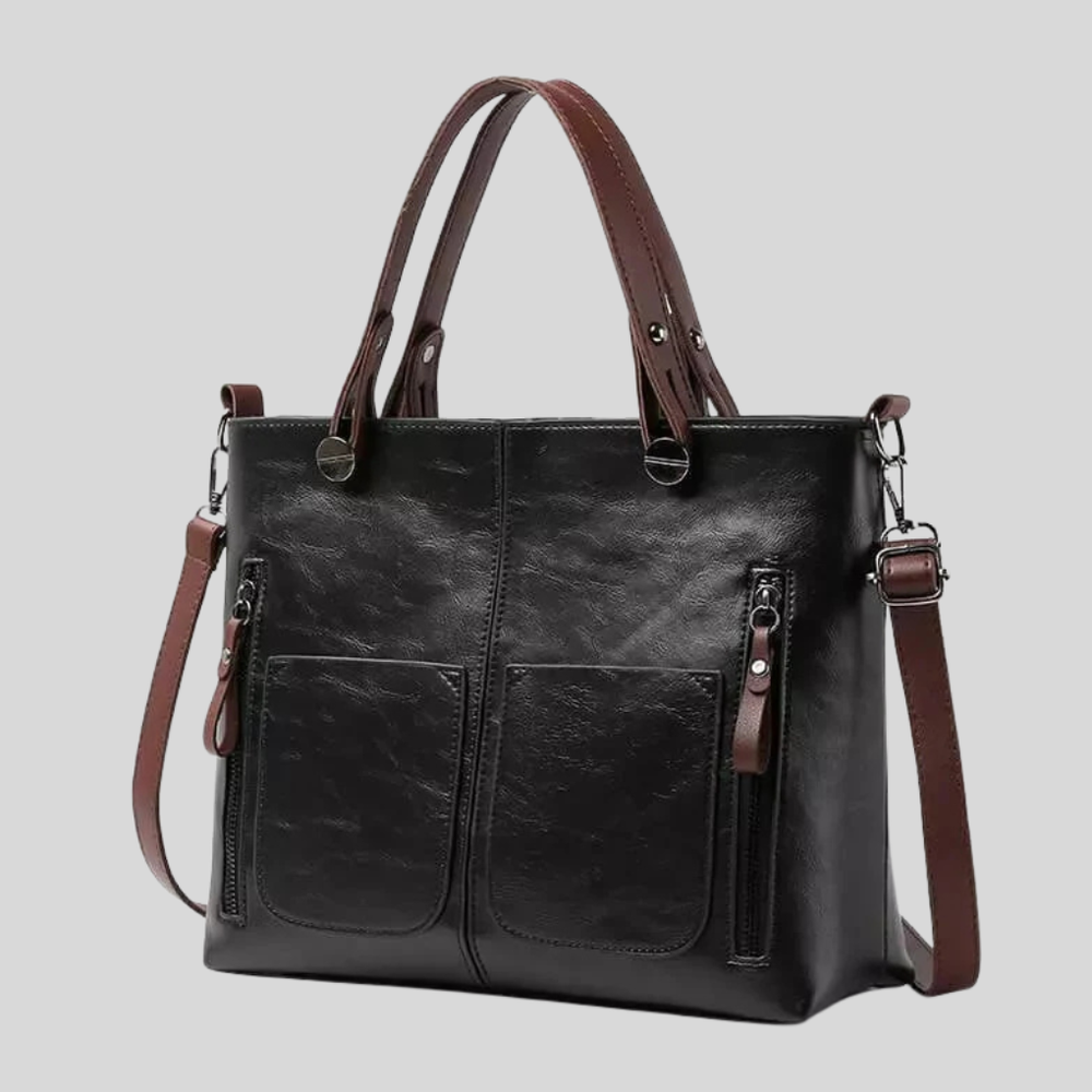 Zwarte dames leren schoudertas van echt leer, met verstelbare riem. Een luxe en veelzijdig accessoire voor elke outfit.