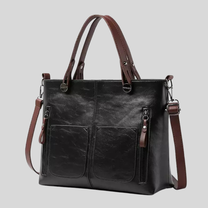 Zwarte dames leren schoudertas van echt leer, met verstelbare riem. Een luxe en veelzijdig accessoire voor elke outfit.