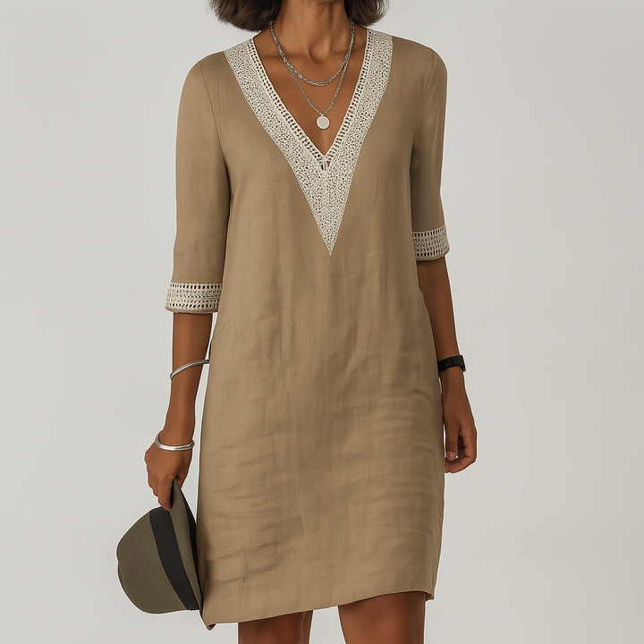 Elegante dames linnen zomerjurk, perfect voor comfort en stijl op warme dagen en zomeravonden.