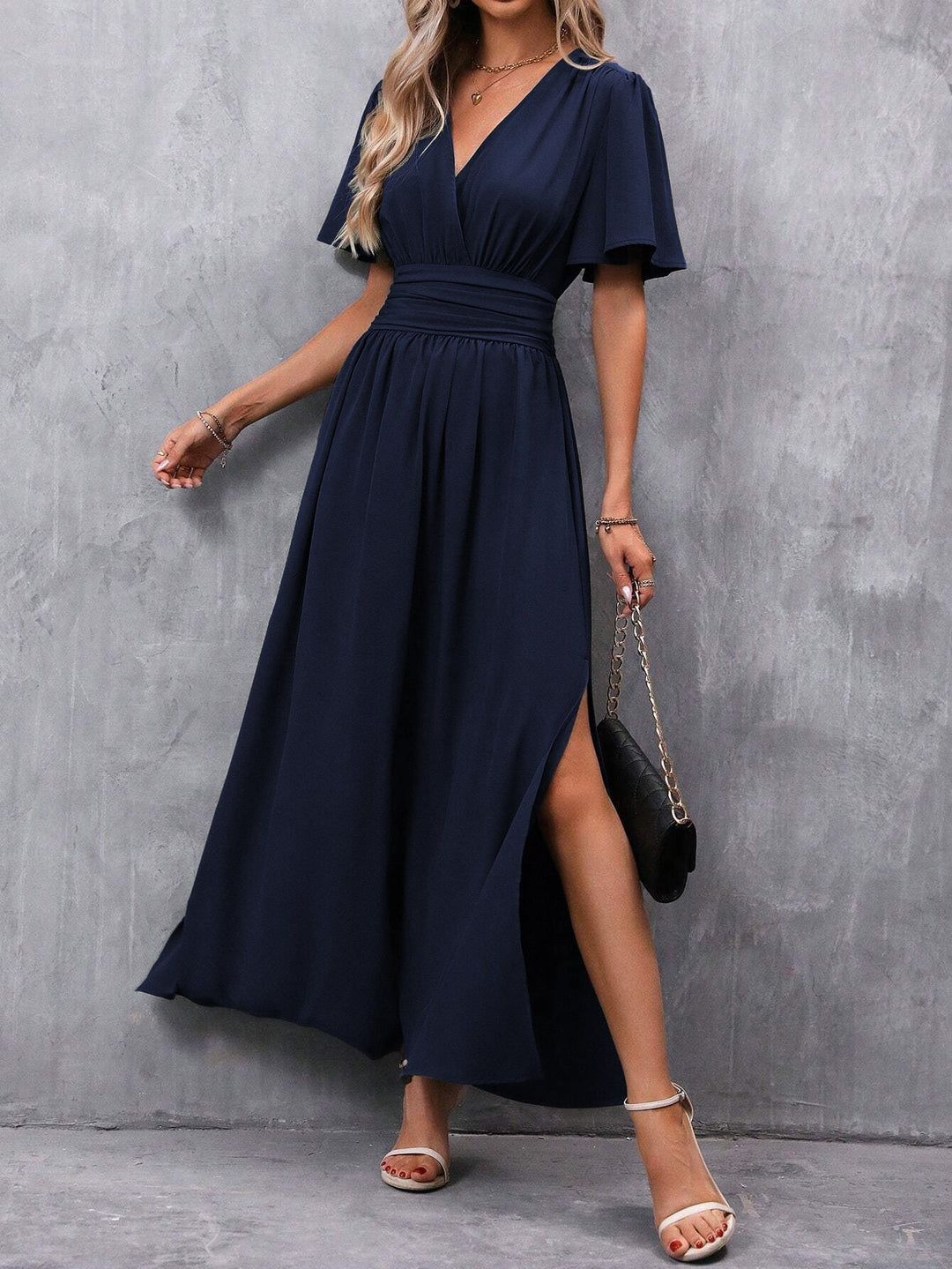 Stijlvolle polyester dames maxi-jurk met empire taille en V-hals, geschikt als feestjurk.