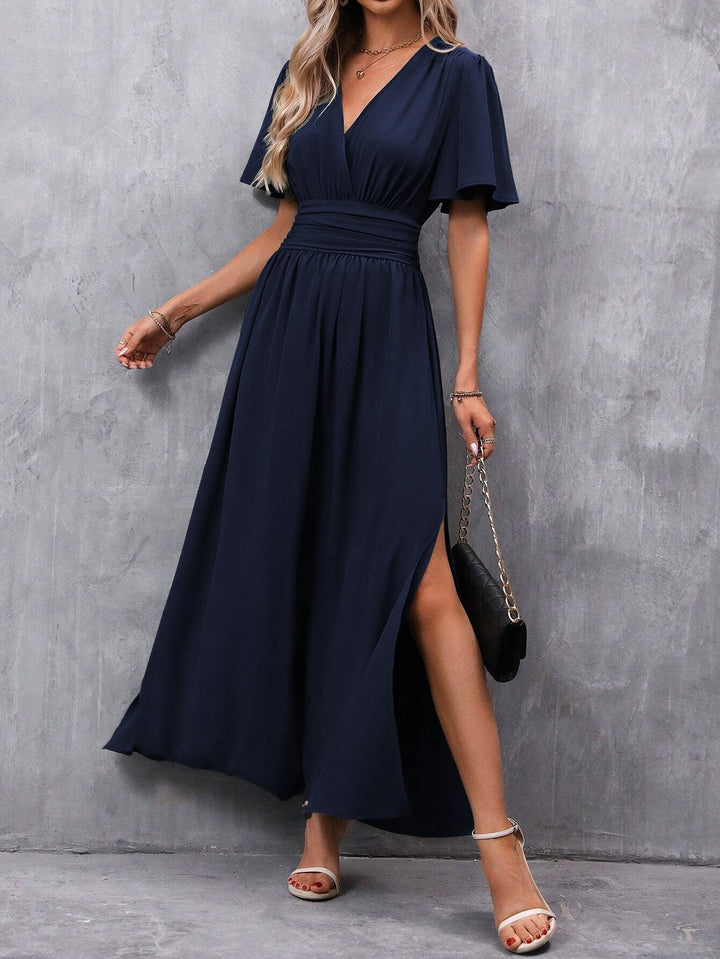 Stijlvolle polyester dames maxi-jurk met empire taille en V-hals, geschikt als feestjurk.