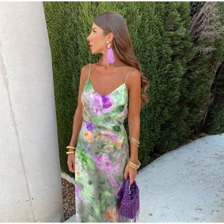 Stijlvolle dames maxi jurk met trendy print en flowy silhouet. Geschikt voor feestjes en zomerse gelegenheden.
