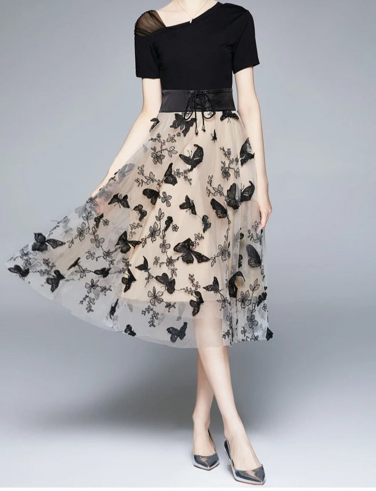 Modieuze zwarte dames midi jurk 'Maila' met semi-transparant mesh en prachtige geborduurde details; lente/zomer.