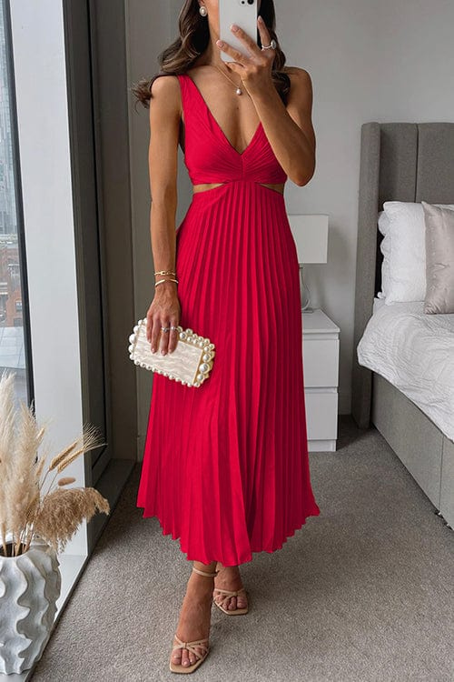 Zomerse mouwloze A-lijn damesjurk met V-hals. Comfortabele midi jurk met elegante plooien.