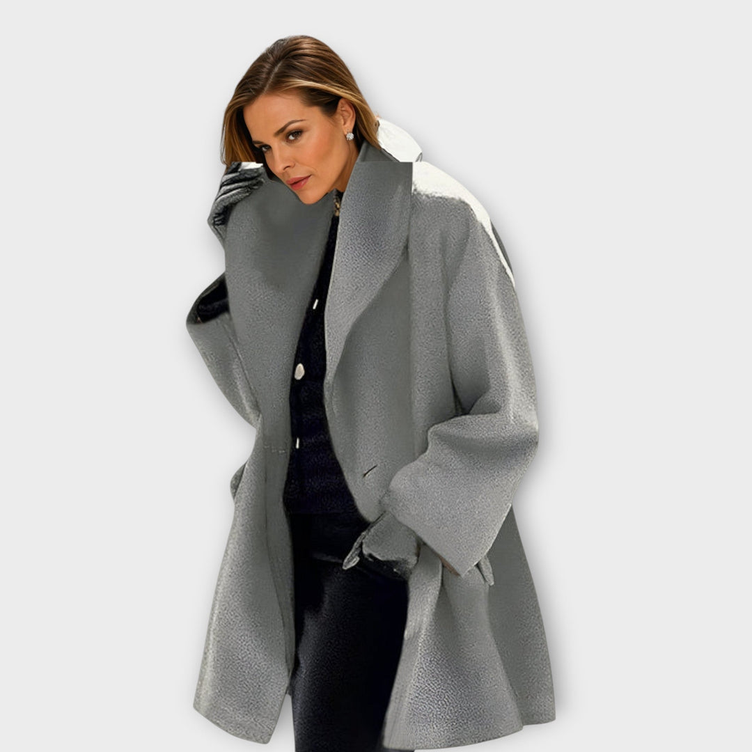 Veelzijdige dames oversized wikkeljas, combineerbaar voor een casual of chique winter outfit. Warme bovenkleding.