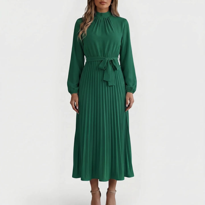 Midi-jurk met lange mouwen en strikceintuur, plooien zorgen voor een elegante pasvorm, diverse kleuren.