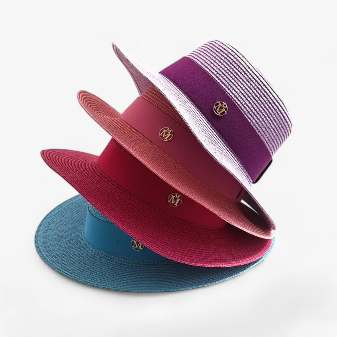 Elegante dames strohoed met brede rand voor optimale zonbescherming en een stijlvolle zomerlook.