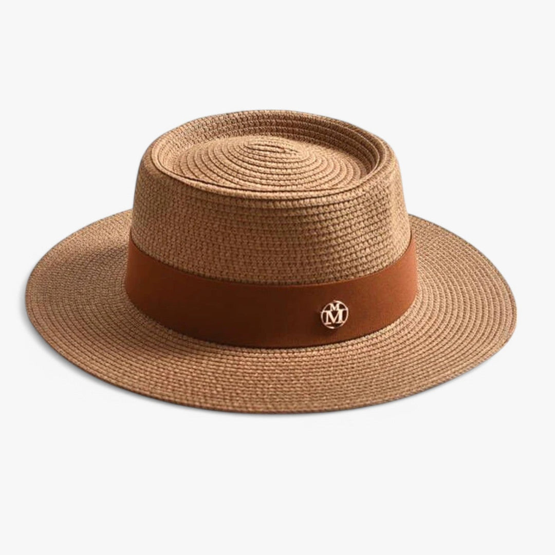 Chique dames strohoed, essentieel mode accessoire met brede rand voor een elegante zomerstijl.