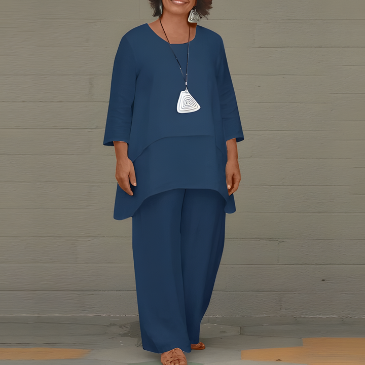 Comfortabele dames tweedelige zomeroutfit: luchtige top en broek met relaxte pasvorm voor ultieme stijl.