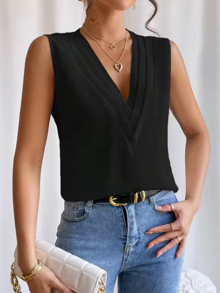 Comfortabele mouwloze dames top met V-hals, ideaal als stijlvolle zomerkleding of casual mode.