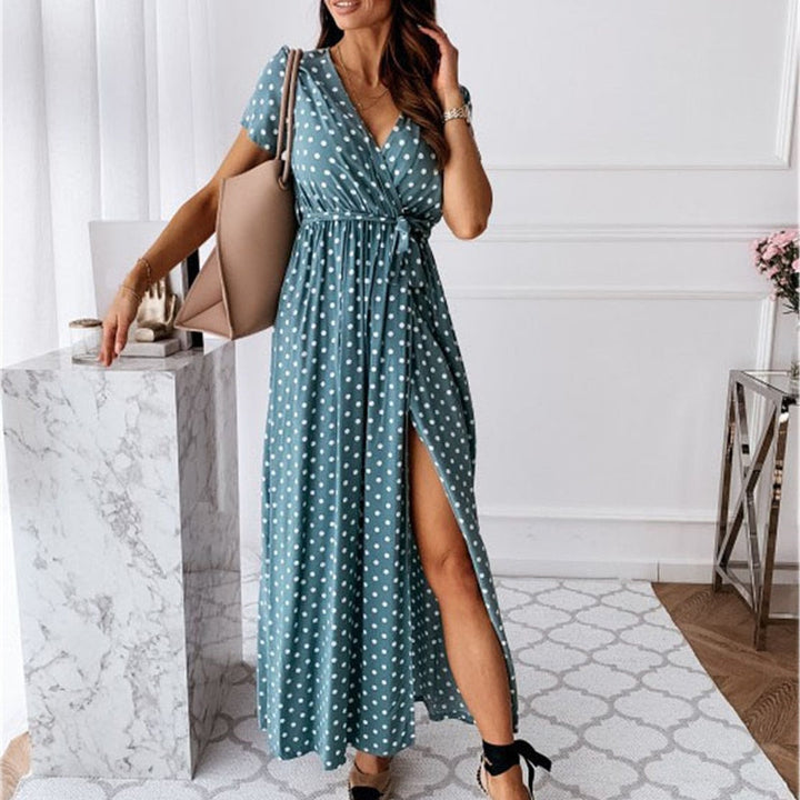 Chique VeeDress™ jurk voor dames met diepe V-hals en split. Modieuze en comfortabele outfit.