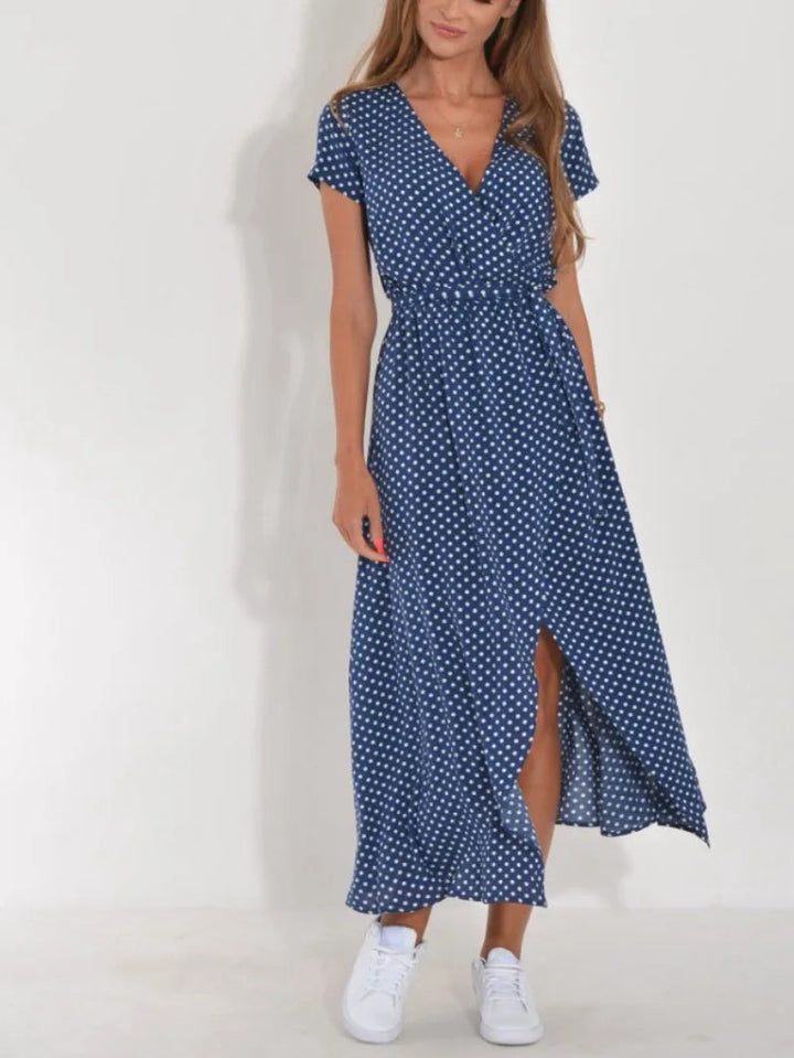 Veelzijdige elegante dames midi jurk met bloemenprint, geschikt voor zowel formele als informele gelegenheden.