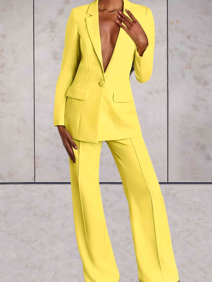 Elegante dames zakelijke tweedelige set: klassieke blazer en comfortabele wijde broek voor een professionele outfit.