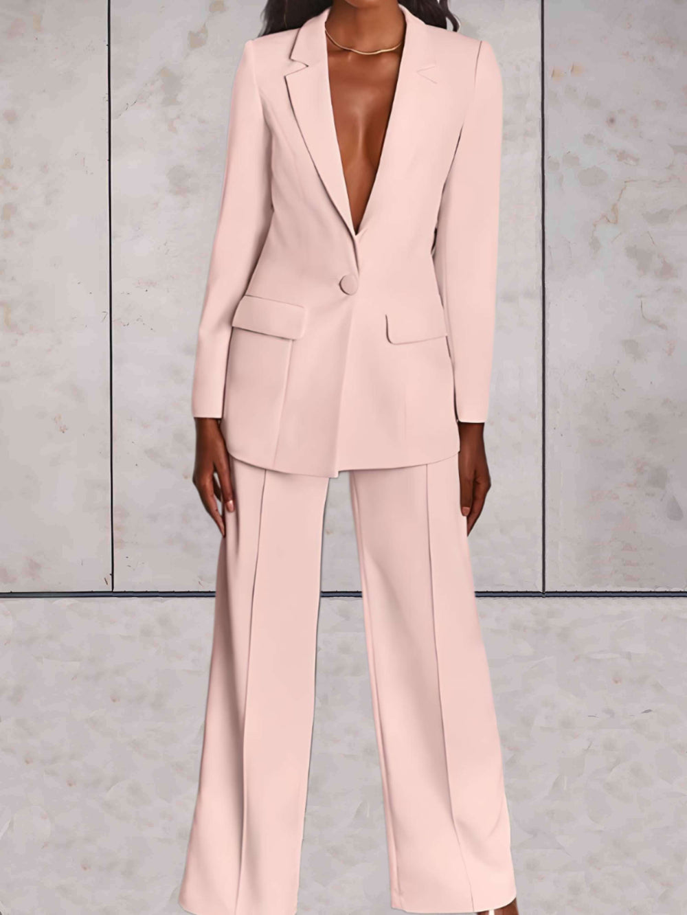 Dames business chic set Emilia met stijlvolle blazer en moderne wijde broek, perfect voor formele gelegenheden.
