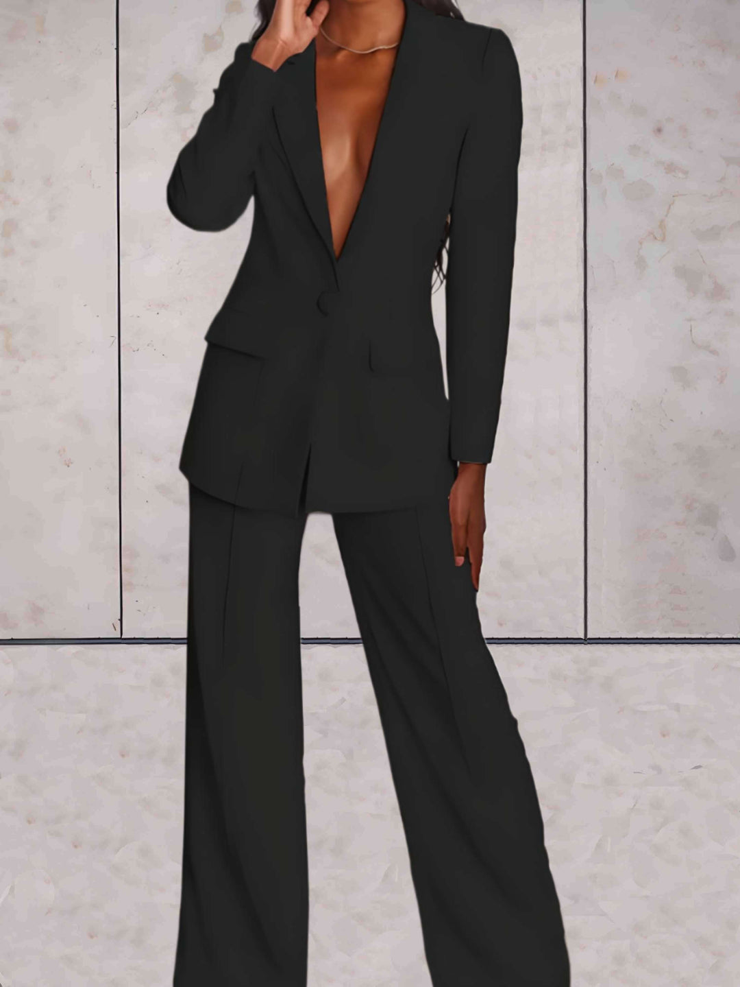 Comfortabele damesmode: elegante tweedelige set met blazer en wijde broek voor een stijlvolle en professionele look.