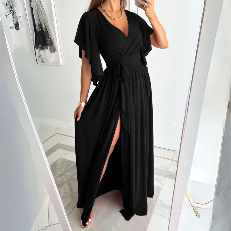 Comfortabele en modieuze dames zomerjurk. Kenmerken: V-hals, elegante bell mouwen en een luchtige snit.