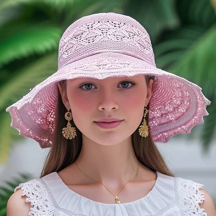 Elegante dames zonnehoed met brede rand, ideaal voor zomer en strand. Biedt optimale UV-bescherming.