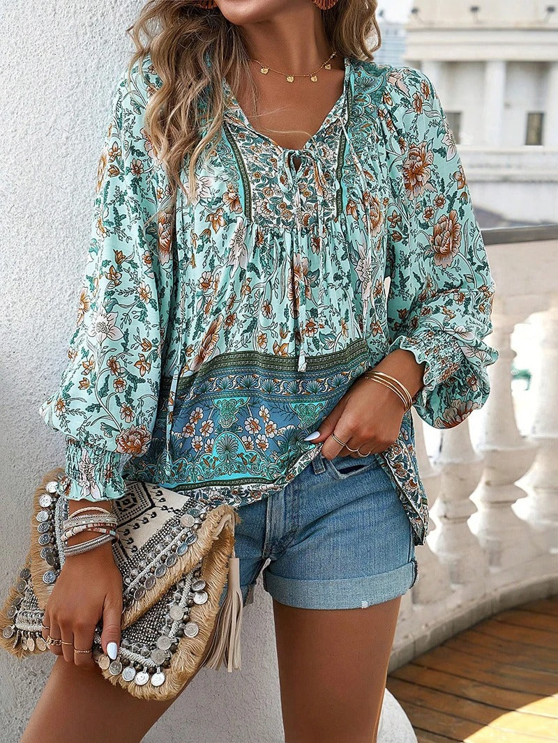 Lentemode: Frisse damesblouse met bloemenprint en lange mouwen. Elegante en comfortabele top voor dagelijks gebruik.
