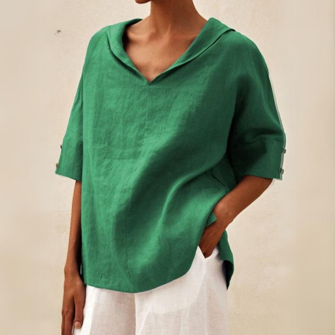 Elegante damesblouse met kraag en korte mouwen, ideaal voor zakelijke of casual zomeroutfits.