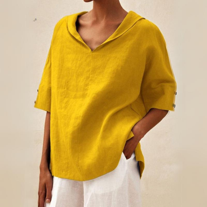 Comfortabele dames blouse met V-hals, korte mouwen en kraag, perfect voor zomerse dagen.