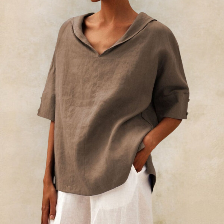 Luchtige damesblouse met korte mouwen en kraag, ideaal voor comfortabele en modieuze zomerstijlen.