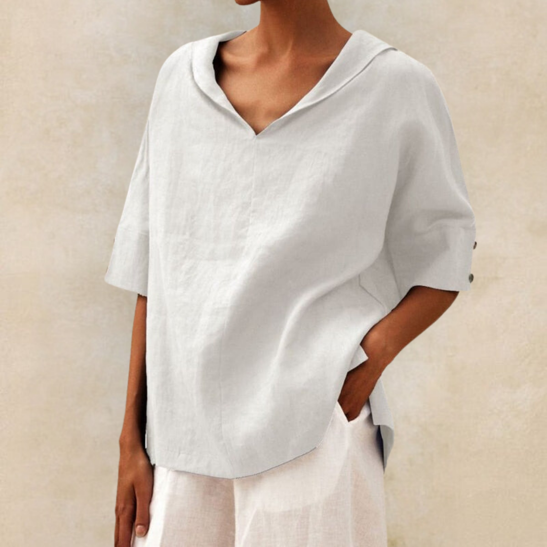 Veelzijdige damesblouse met kraag en korte mouwen, geschikt voor elegante zakelijke of casual lente/zomer outfits.