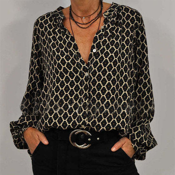 Trendy damesblouse met v-hals, lange mouwen en unieke print; comfortabel en elegant voor vrouwen.