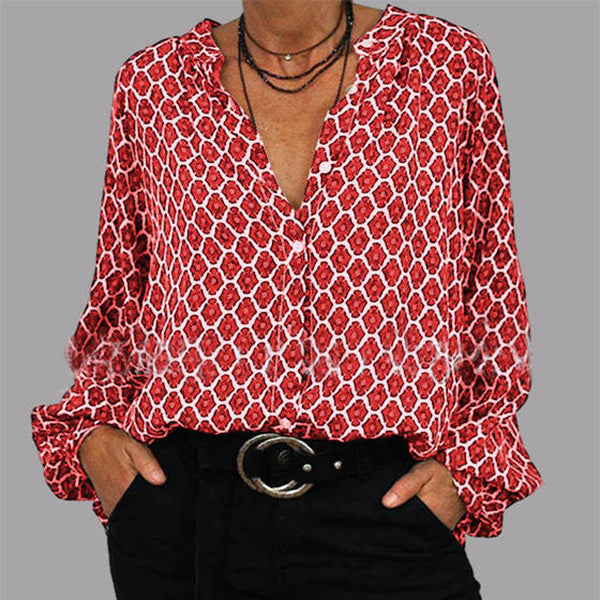 Stijlvolle damesblouse met levendige print, lange mouwen en v-hals; ideale seizoensmode.