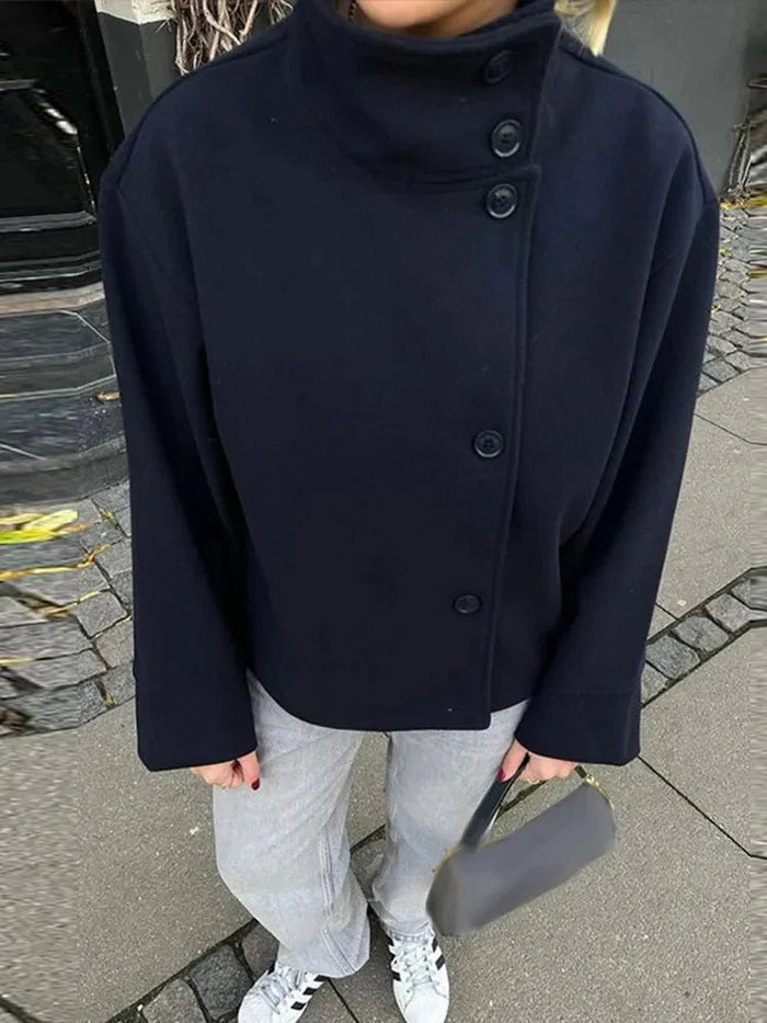 Moderne dames overgangsjas met opstaande kraag in grijs, perfect voor zowel herfst- als lenteoutfits.