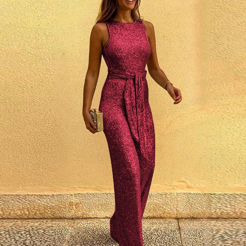 Gouden feestelijke RachelJimpsuit voor dames, een stijlvolle en comfortabele outfit voor speciale momenten.