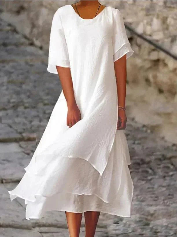 Veelzijdige dames midi jurk in A-lijn, gelaagd design, ideaal voor zowel casual als elegante zomerlooks.