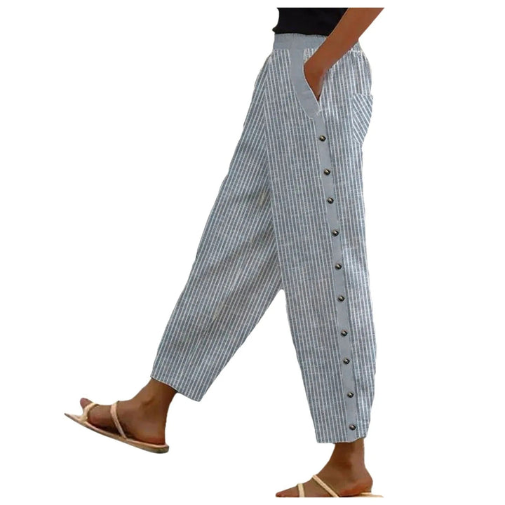 Comfortabele gestreepte hoge taille broek voor dames, model Florence, met decoratieve knopen en zakken.