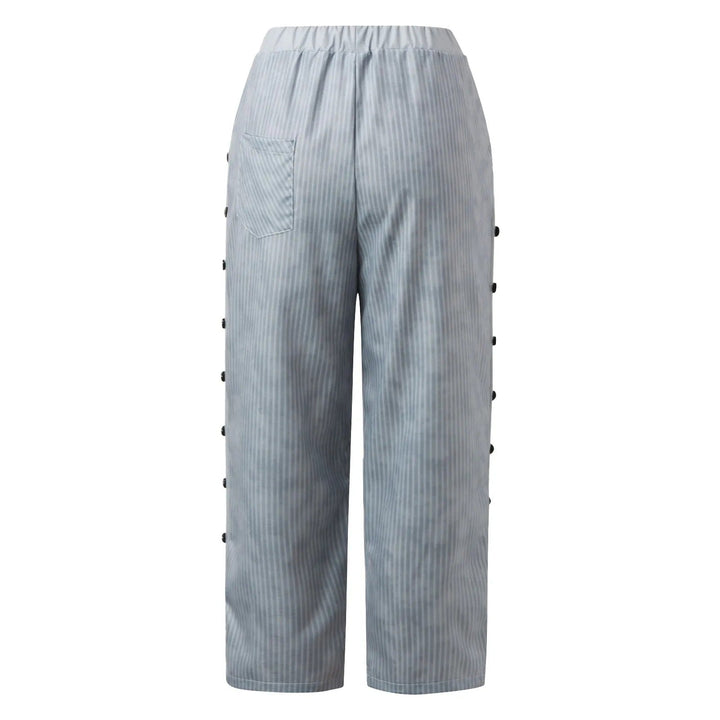 Chique gestreepte damesbroek met hoge taille, decoratieve knopen en een tijdloos design. Comfortabel en trendy.