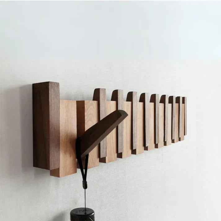 Elegante houten wandkapstok met uniek piano design. Prachtige interieurdecoratie voor elke moderne hal.